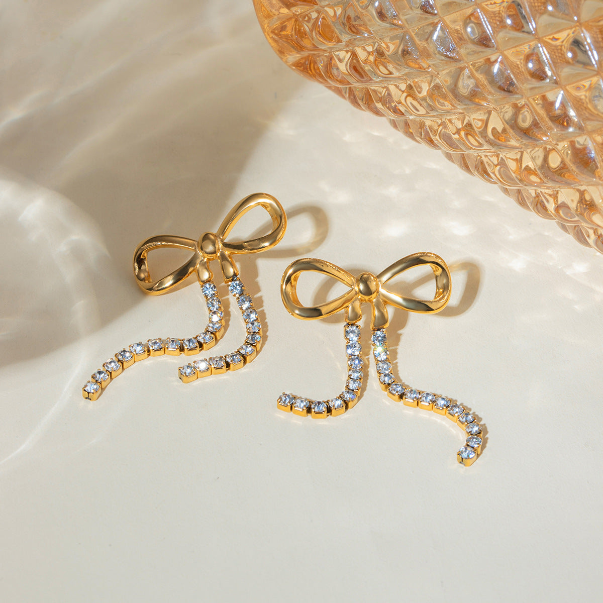 18k gold stainless steel bow hanging two diamond chain earrings vacuum electroplating non-fading jewelry wholesale diamond setting