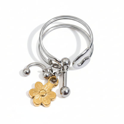 Piercing Gold And Silver Ring