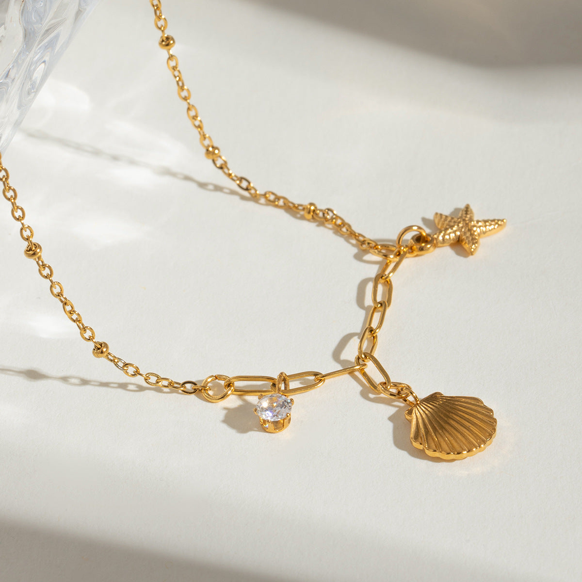 Quiet design European and American fashion necklace 18k gold stainless steel white zircon hammered starfish pendant necklace