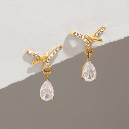 Jingqiao stainless steel earrings, rhinestone bows, teardrop-shaped zircon pendants, titanium steel cross-border accessories that do not fade