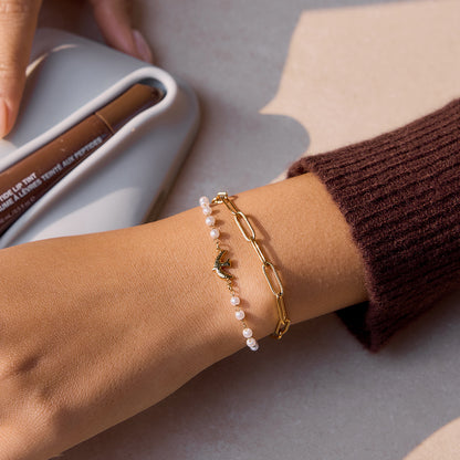 Jingqiao Sweet Style 18K gold stainless steel Flying Bird series pearl jewelry bracelet, light luxury high-end cross-border accessory
