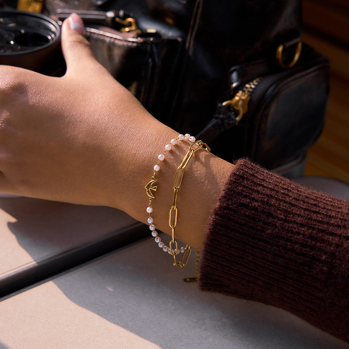 Jingqiao Sweet Style 18K gold stainless steel Flying Bird series pearl jewelry bracelet, light luxury high-end cross-border accessory