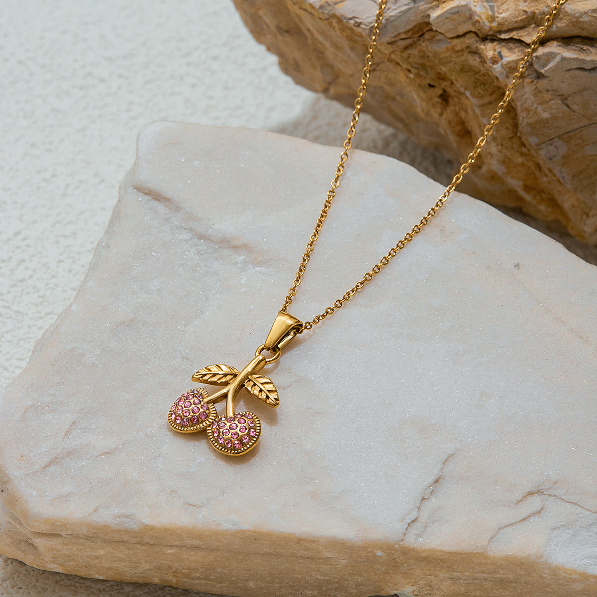 Quiet European and American stainless steel necklace, light luxury and high-end 18K gold titanium steel design sense pink zirconium cherry pendant accessories