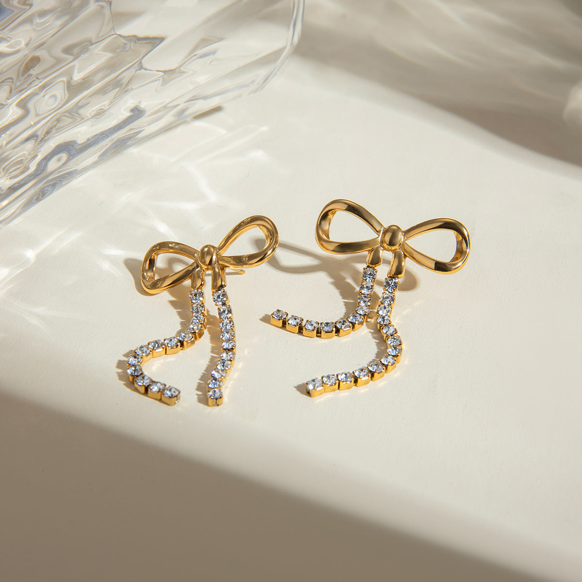 18k gold stainless steel bow hanging two diamond chain earrings vacuum electroplating non-fading jewelry wholesale diamond setting