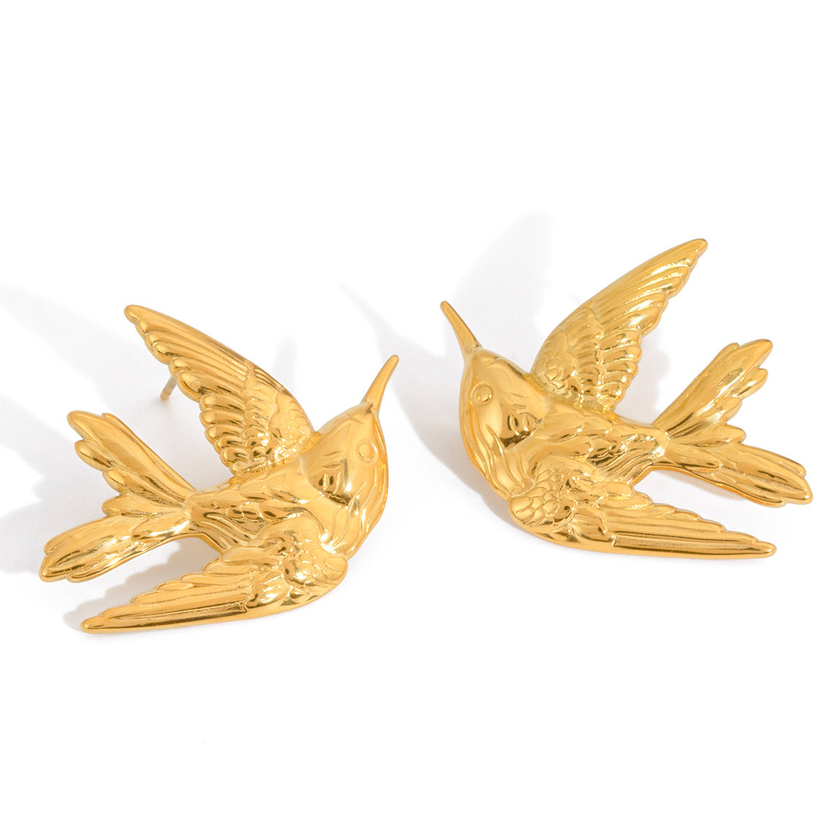 Quiet classic style, stainless steel and flat dove-shaped stud earrings, European and American design, unique sense of design, light luxury and high-end earrings