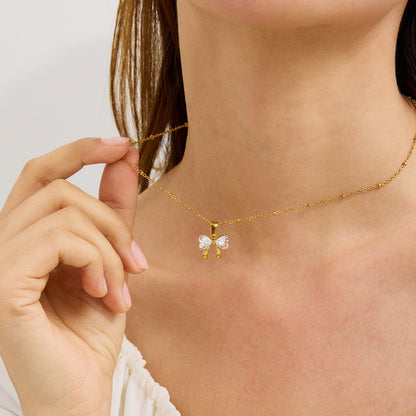 Elegant design with a fashionable and versatile 18k gold stainless steel bow, white zircon pendant necklace