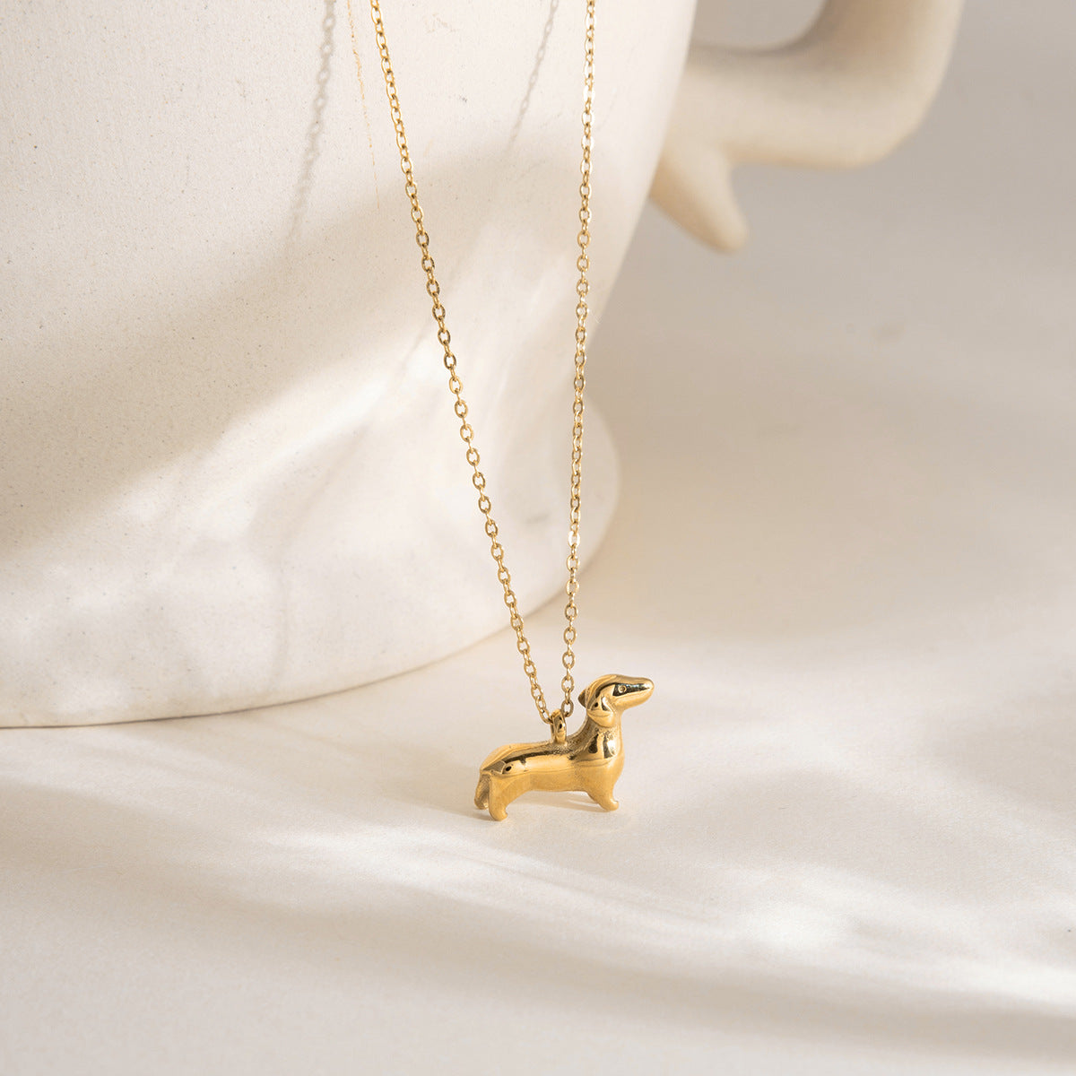 Quiet and sweet style stainless steel cute dog necklace accessories women's sweater chain light luxury luxury cross-border jewelry design