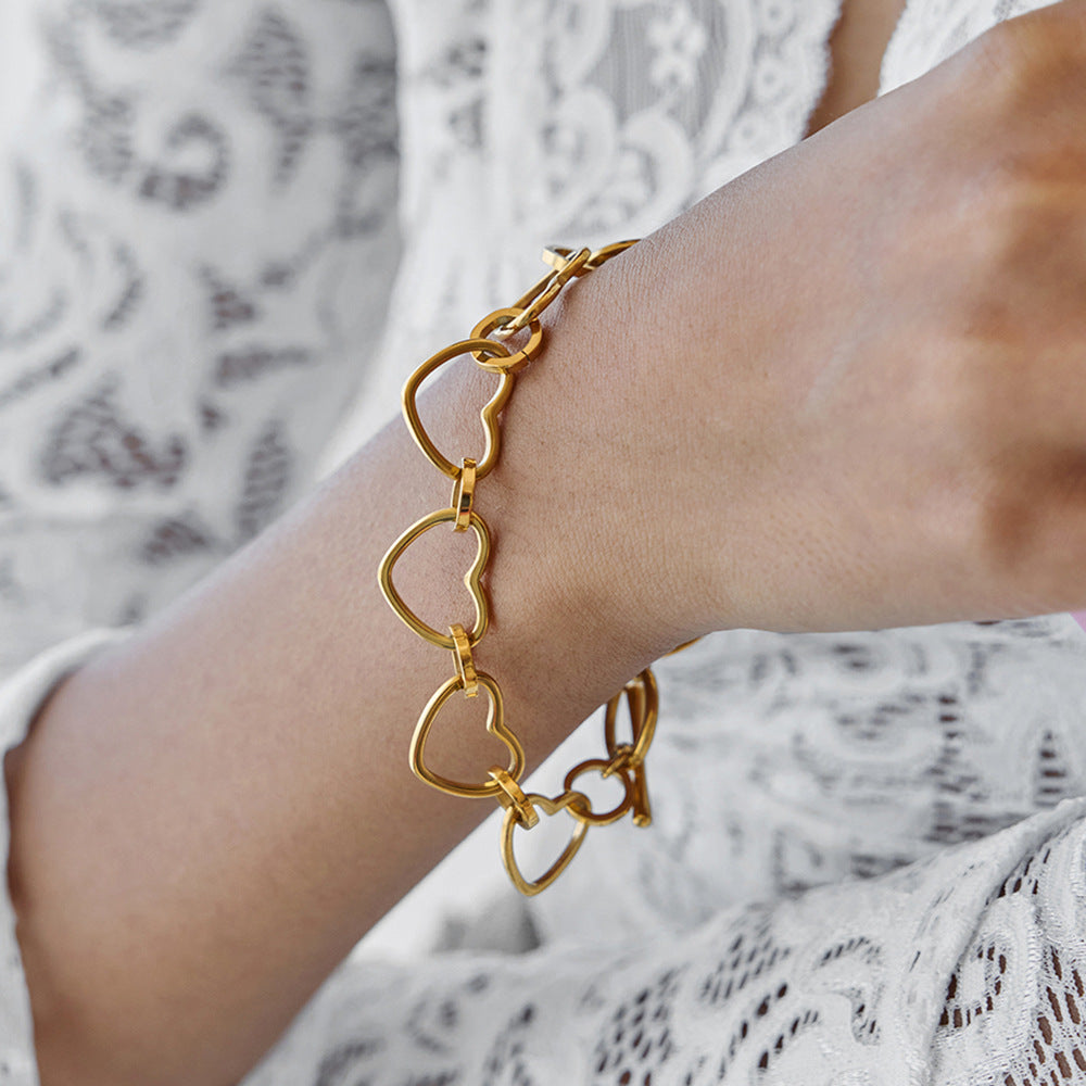 Jingqiao design classic style 18K gold stainless steel hollow heart chain OT clasp stainless steel bracelet accessory