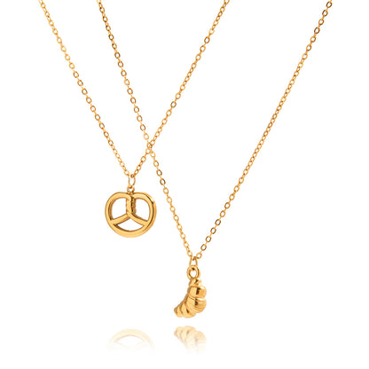 Jingqiao European and American titanium steel fading necklace for women, fun horn bag pendant necklace, light luxury niche design accessory for women
