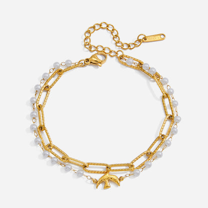 Jingqiao Sweet Style 18K gold stainless steel Flying Bird series pearl jewelry bracelet, light luxury high-end cross-border accessory