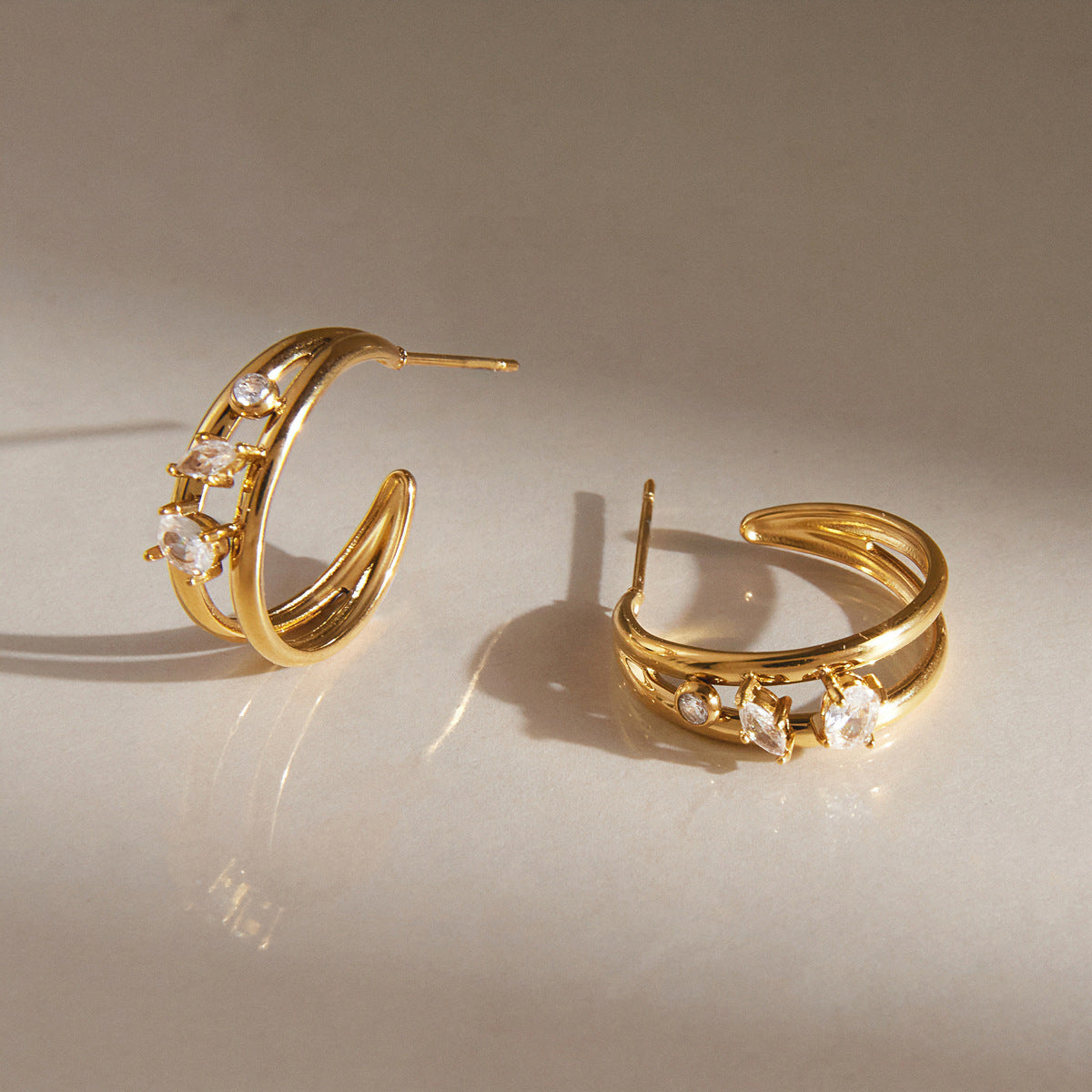 Jingqiao titanium steel zircon C-shaped earrings for women, colorless earrings, light luxury high-end stainless steel cross-border accessories wholesale