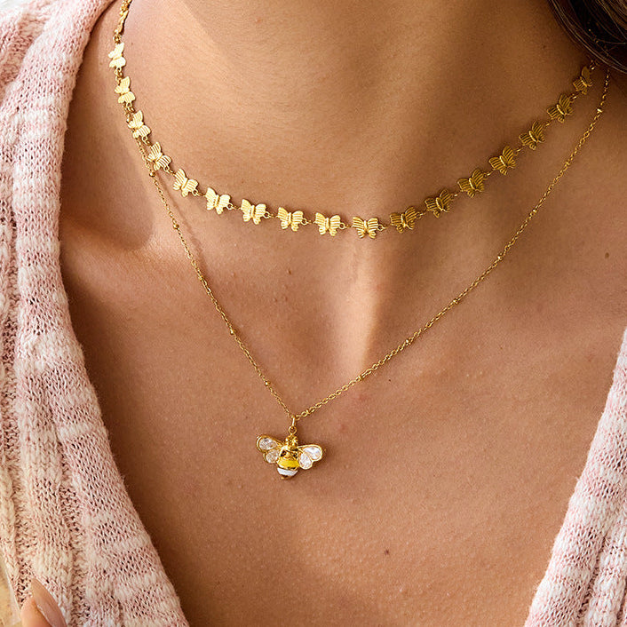 Jingqiao sweet style stainless steel zircon oil-dripping bee necklace accessory for women's autumn and winter, titanium steel color-resistant cross-border accessory