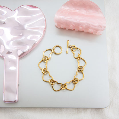 Jingqiao design classic style 18K gold stainless steel hollow heart chain OT clasp stainless steel bracelet accessory